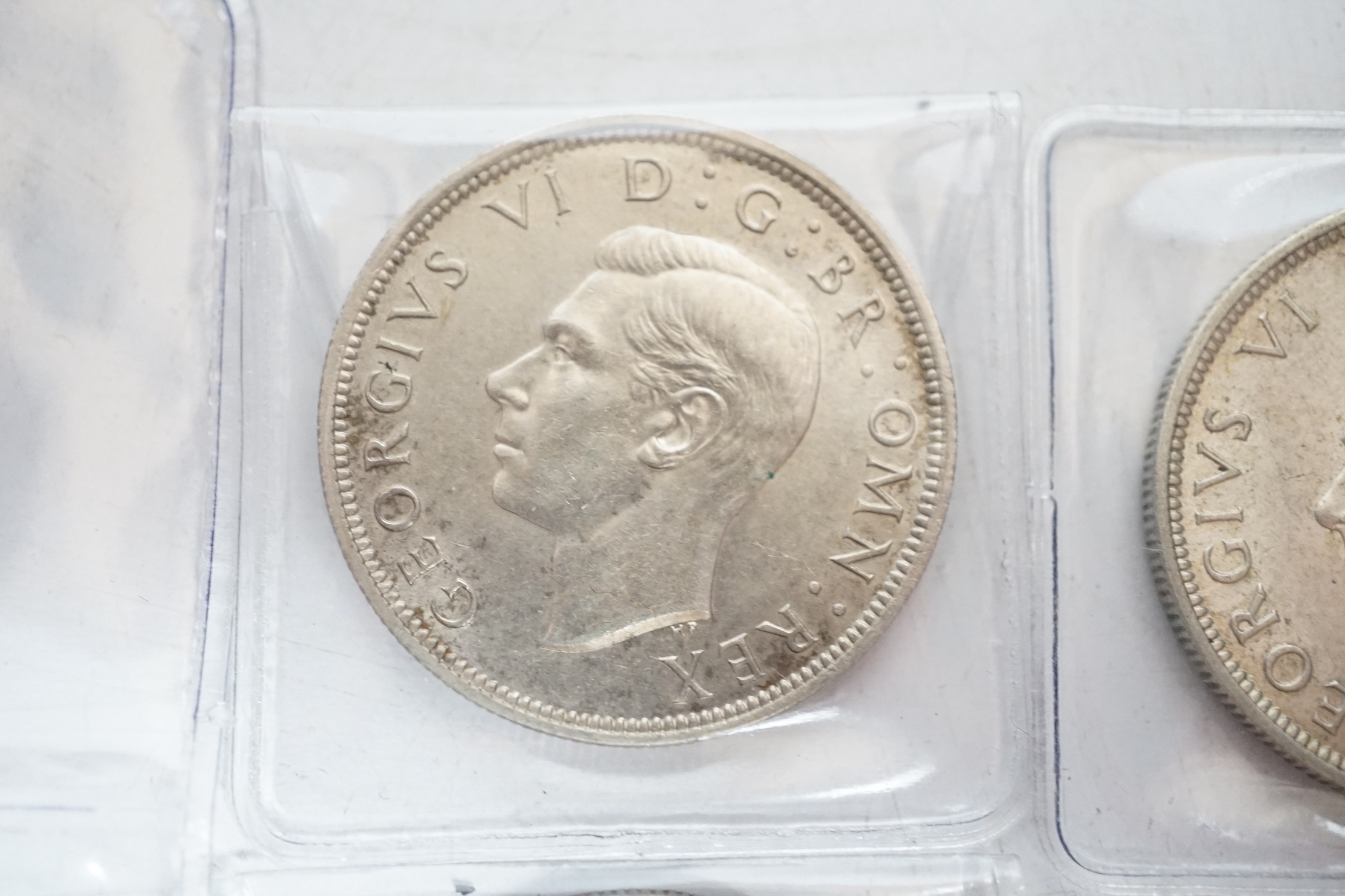 UK coins, 1938 and 1942 half crowns, 1736 farthing, 1806 penny, 1942 and a ZuidAfrica 2 shillings